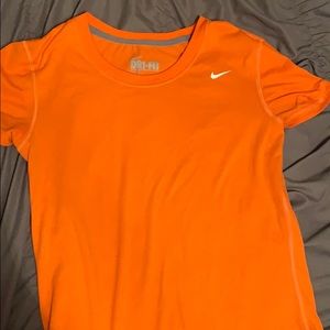 Women’s orange and black Nike dri-fit